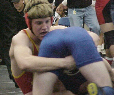 On the team, we got to wear wrestling suits - red singlets - that showed of...